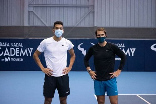 Felix Auger-Aliassime (L) and Rafael Nadal