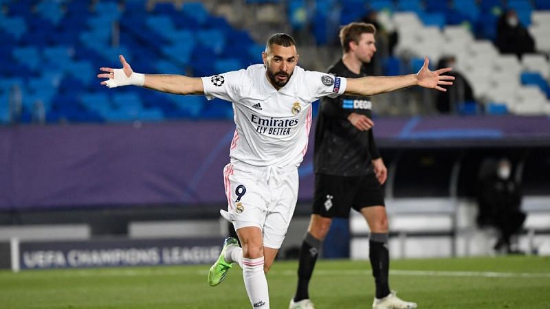 Benzema propelled Real Madrid into the knockout stages with a first-half brace on another landmark appearance