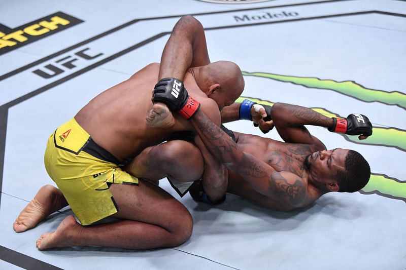 Kevin Holland elbows Jacare Souza of Brazil in their middleweight bout