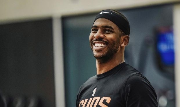 Chris Paul wearing Phoenix Suns gear