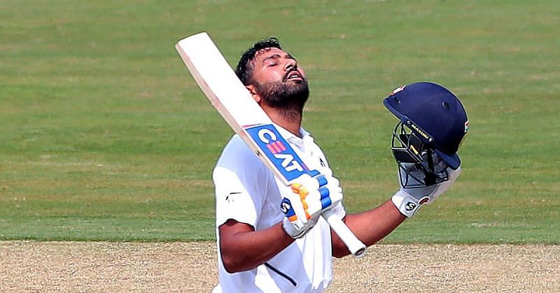 Rohit Sharma celebrates after scoring a century