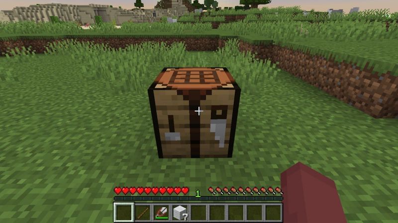 Once you have a minimum of 6 pieces of wool, you can place down your crafting table to start crafting