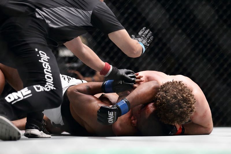 Ben Askren of the United States (top) fights Agilan Thani of Malaysia