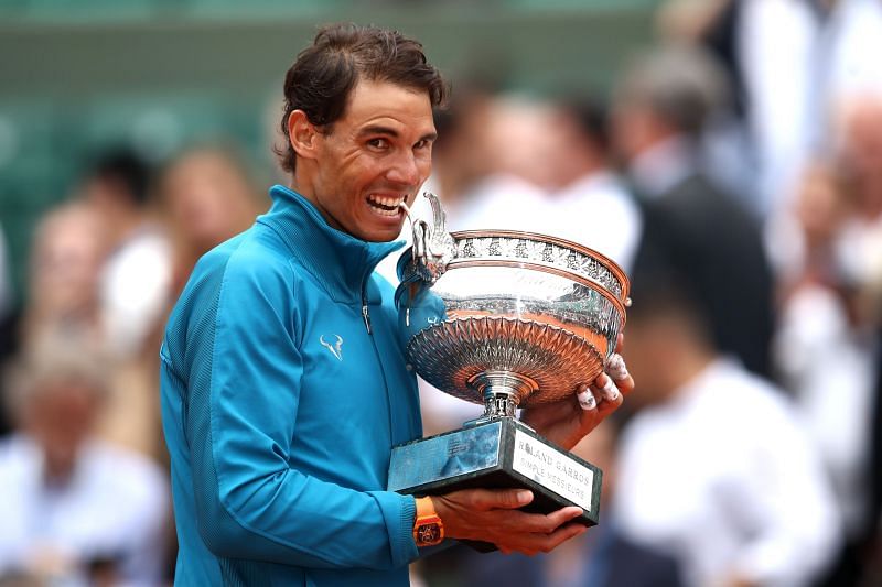 Rafael Nadal with his 2018 French Open trophy