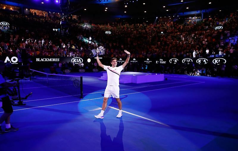 Roger Federer celebrates after winning the 2018 Australian Open