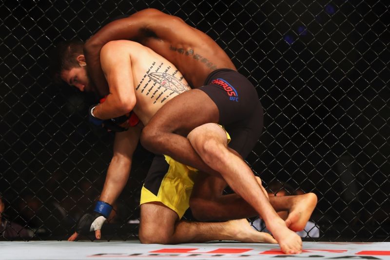 Leon Edwards (black shorts) of England and Bryan Barberena of the USA