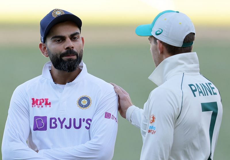 Virat Kohli (L) and Tim Paine (R) after the first Test ended inside three days