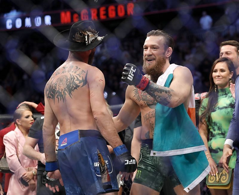 Conor McGregor embraces Donald Cerrone at UFC 246