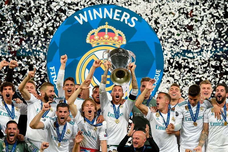 Real Madrid players celebrate their 2017-18 UCL win.