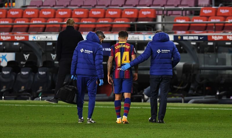 Philippe Coutinho limps off in the game against SD Eibar