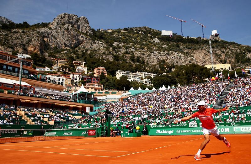 Novak Djokovic retrieves a shot at the Monte Carlo Masters