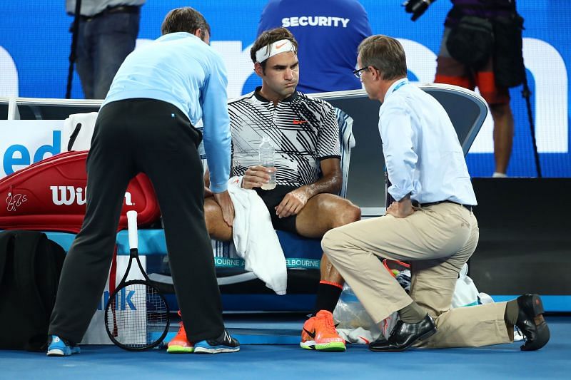 Roger Federer receives treatment during the 2017 Australian Open
