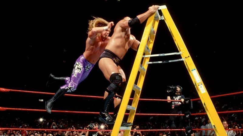 the rock vs triple h ladder match