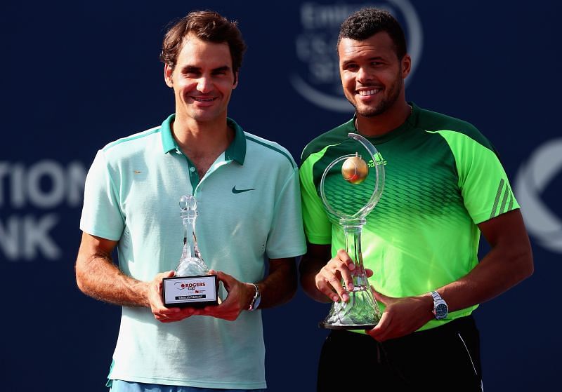 Roger Federer (L) and Jo-Wilfried Tsonga at Rogers Cup 2014
