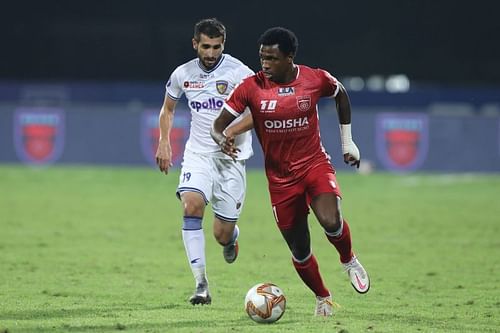 Diego Mauricio (in red) with the ball (Image courtesy: ISL)