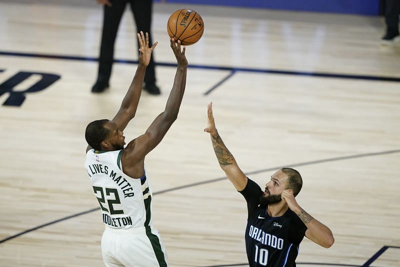 Khris Middleton shoots over Evan Fournier&nbsp;