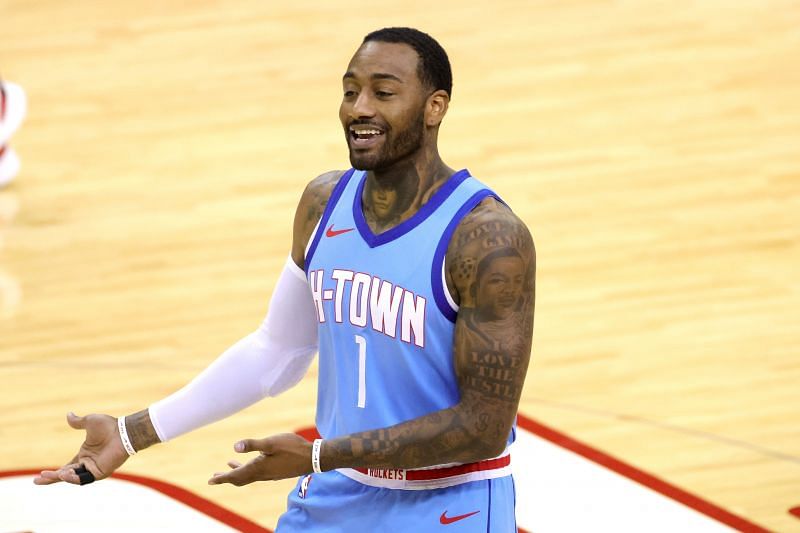 John Wall #1 of the Houston Rockets reacts to the Washington Wizards bench during the fourth quarter at Toyota Center on January 26, 2021 (Photo by Carmen Mandato/Getty Images)