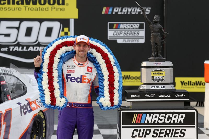 Denny Hamlin celebrates one of his seven victories in 2020, this one at Talladega Superspeedway in October. (Photo by Chris Graythen/Getty Images)