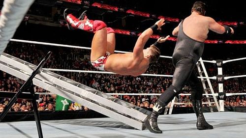 Jerry Lawler dropping The Miz on a ladder during their TLC Match for the WWE Championship