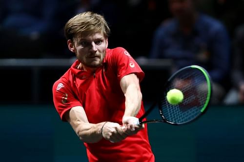 David Goffin plays a backhand