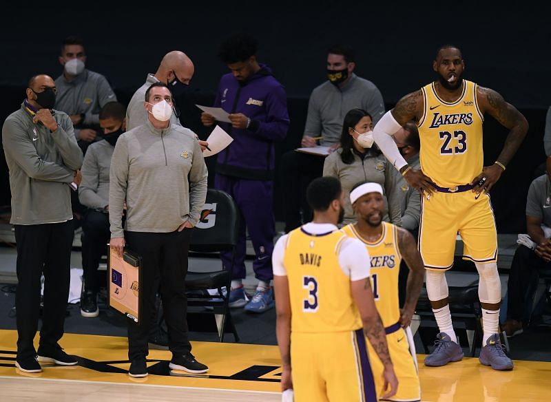 Frank Vogel and LeBron James #23 of the Los Angeles Lakers react after a Portland Trail Blazers score and foul during a 115-107 Trail Blazer win earlier in the season