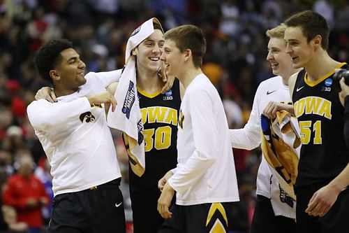 Connor McCaffery of the Iowa Hawkeyes celebrates with teammates