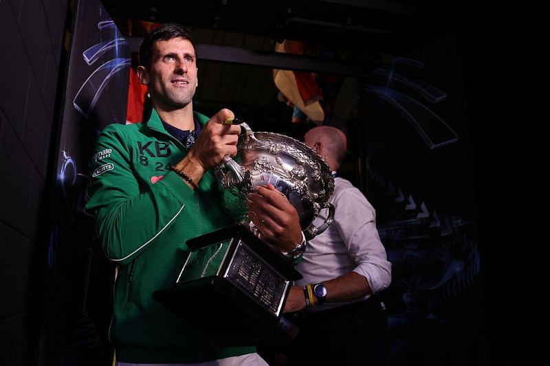 Novak Djokovic with the 2020 Australian Open trophy