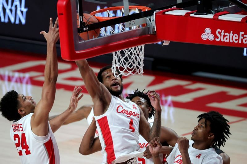 Justin Gorham #4 of the Houston Cougars goes up for an offensive rebound