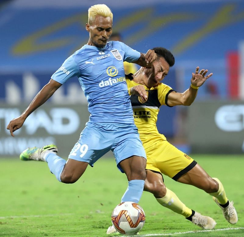 Mumbai City FC&#039;s Bipin Singh in action against Hyderabad FC&#039;s Asish Rai (Image Credits: ISL Media)