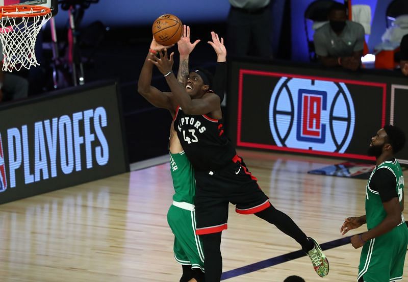 Pascal Siakam #43 of the Toronto Raptors shoots against Jaylen Brown #7 of the Boston Celtics.