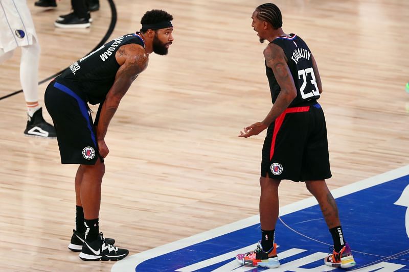 Marcus Morris Sr. #31 of the LA Clippers talks with Lou Williams #23.