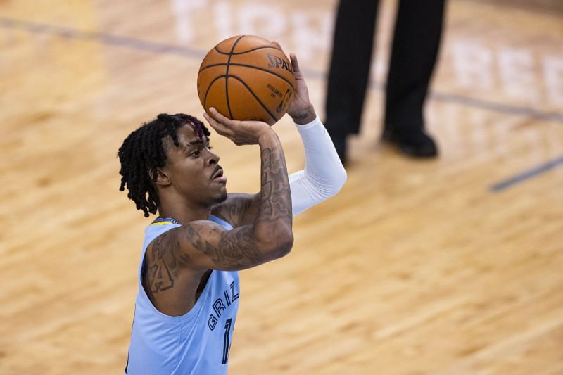 Ja Morant of the Memphis Grizzlies shoots a free throw during the second quarter against the San Antonio Spurs at FedExForum