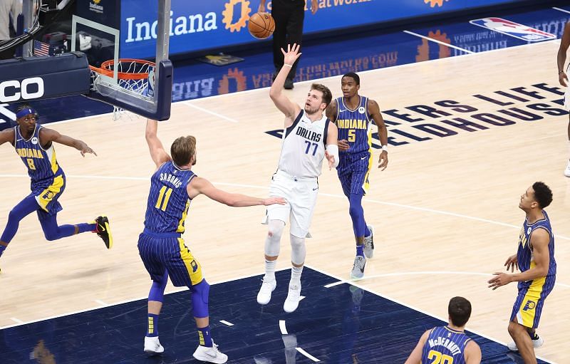 Luka Doncic of the Dallas Mavericks shoots the ball against the Indiana Pacers at Bankers Life Fieldhouse