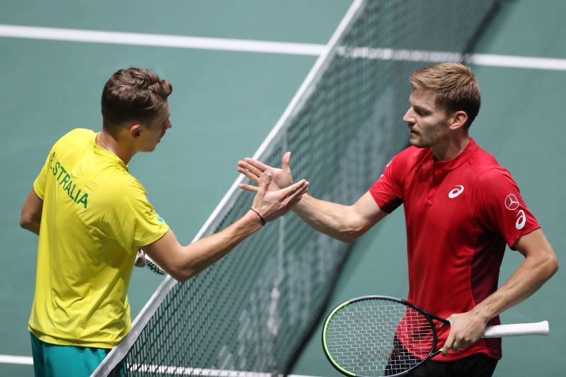 Alex de Minaur shakes hands with David Goffin at the ATP Cup