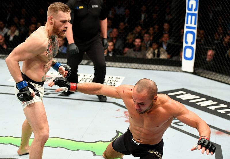 Conor McGregor knocked out Eddie Alvarez to become the UFC&#039;s first simultaneous double champion