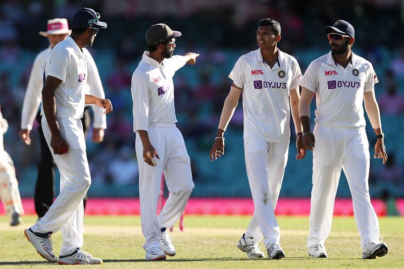 Navdeep Saini with teammates