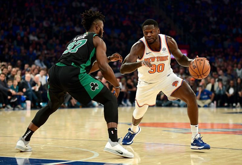 Semi Ojeleye of the Boston Celtics (left) guards Julius Randle of the New York Knicks.&nbsp;