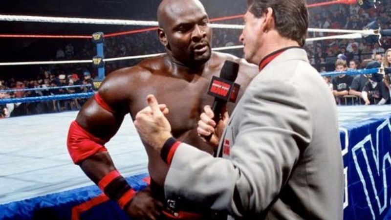 Ahmed Johnson and Vince McMahon in WWE