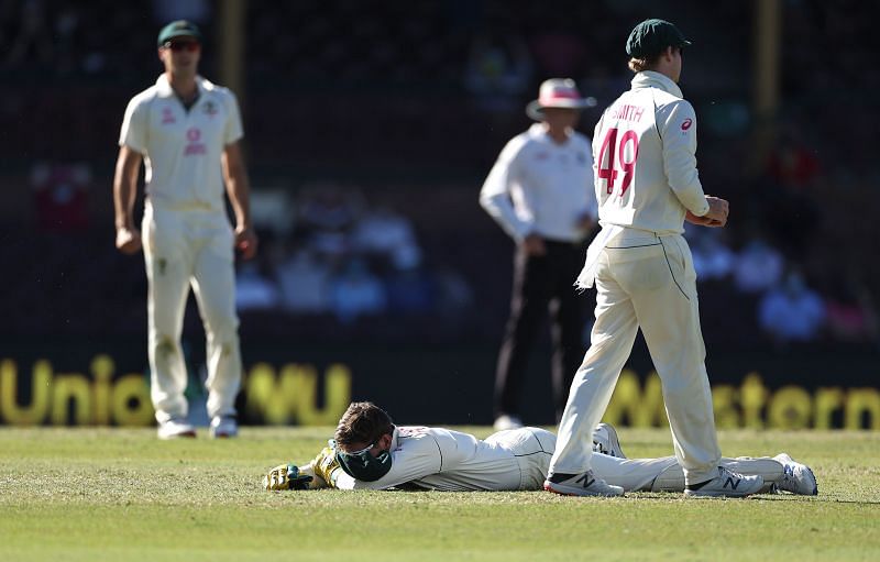 Tim Paine&nbsp;reacts after dropping Hanuma Vihari at the SCG on Day 5 of the Test