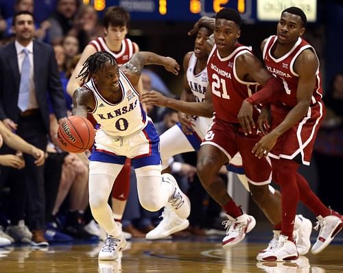 Marcus Garrett #0 of the Kansas Jayhawks steals the ball from the Oklahoma Sooners