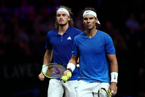 Stefanos Tsitsipas (L) and Rafael Nadal face each other at the ATP Cup