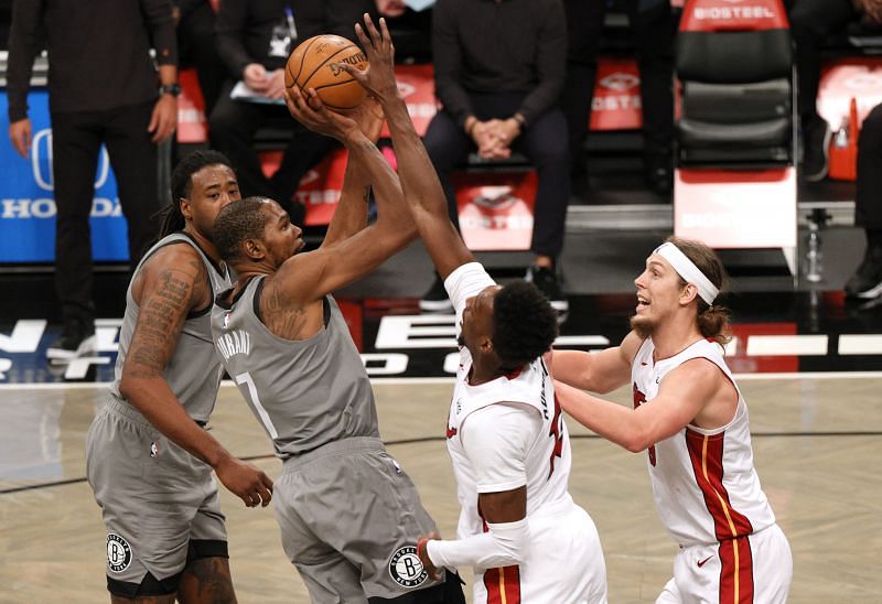 Kevin Durant #7 of the Brooklyn Nets shoots as Bam Adebayo #13