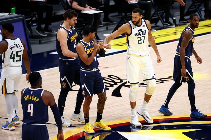 Rudy Gobert (#27) of the Utah Jazz and Gary Harris (#14) of the Denver Nuggets at the Ball Arena.