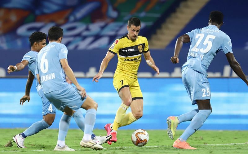 Joel Chianese (in yellow) has added depth to the midfield of Hyderabad FC. (Image: ISL)