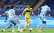 Joel Chianese (in yellow) has added depth to the midfield of Hyderabad FC. (Image: ISL)