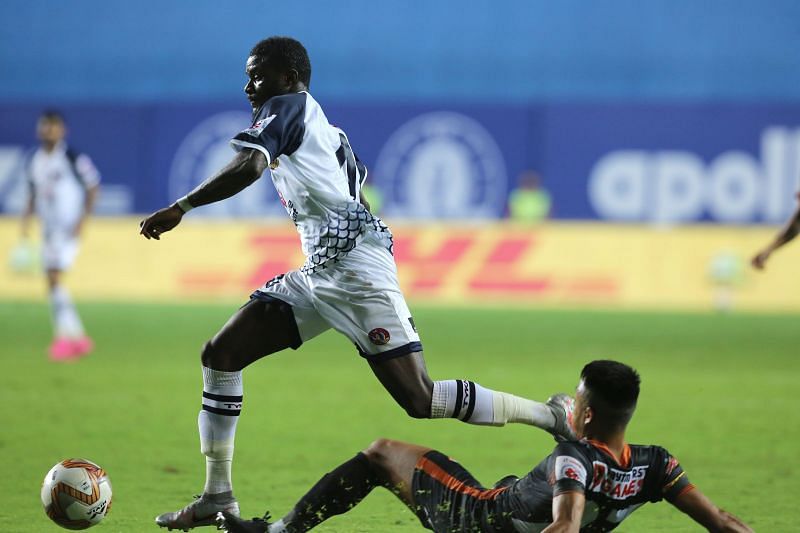 SC East Bengal&#039;s Bright Enobakhare goes past an FC Goa player (Image Courtesy: ISL Media)