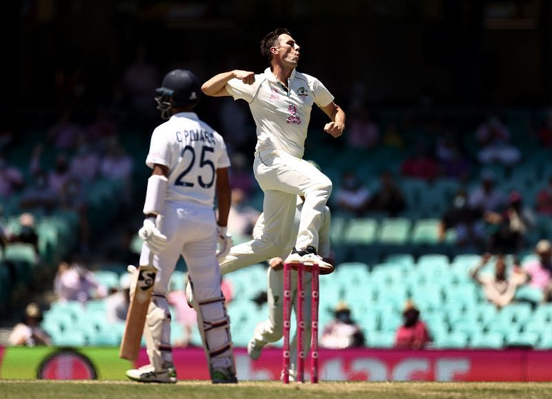 Pat Cummins celebrates after dismissing Cheteshwar Pujara at the SCG.