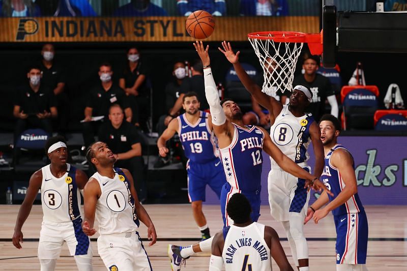 Tobias Harris of the Philadelphia 76ers shoots the ball against Justin Holiday of the Indiana Pacers&nbsp;