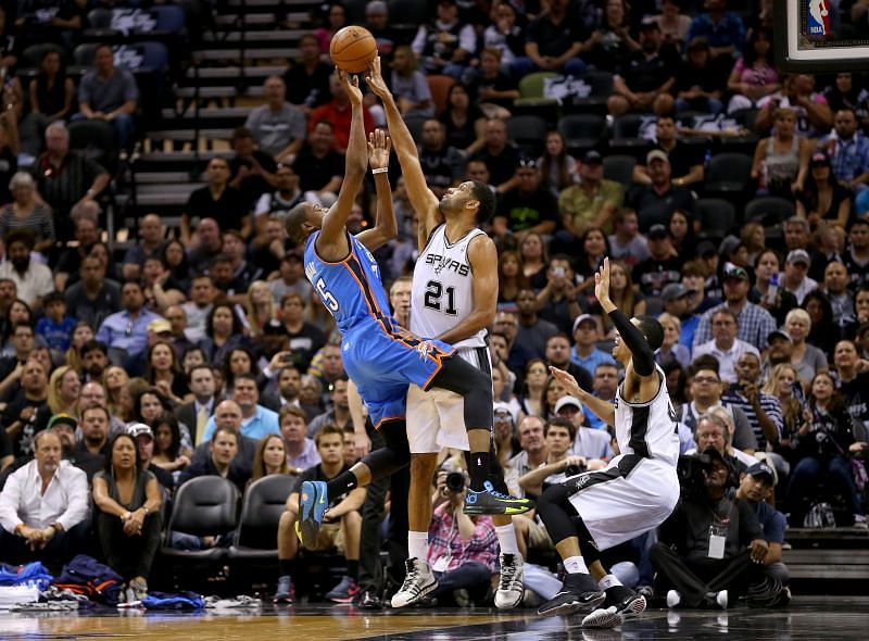 Kevin Durant #35 of the Oklahoma City Thunder has his shot blocked by Tim Duncan #21 of the San Antonio Spurs.