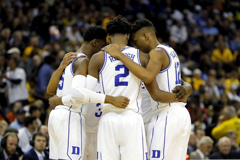 The Duke Blue Devils huddle